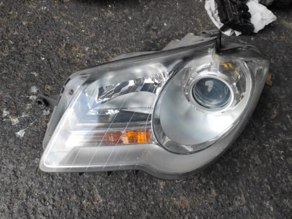 Faro izquierdo Volkswagen Touran I (Versión 2006) 1.9 TDI (105 cv)