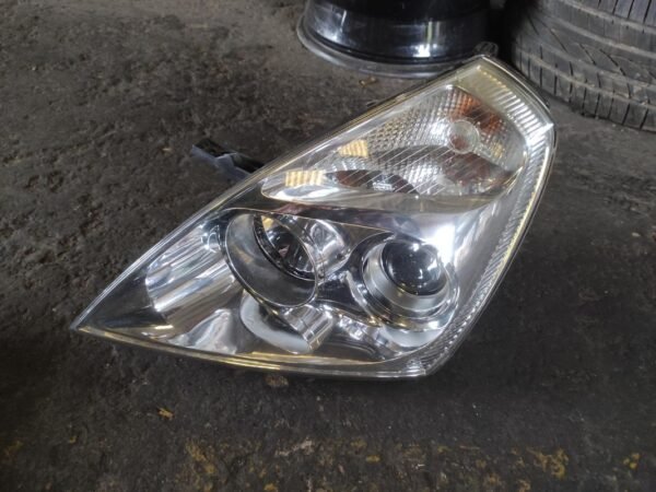 Faro izquierdo Kia Carnival III 2.9 CRDi (185 cv)