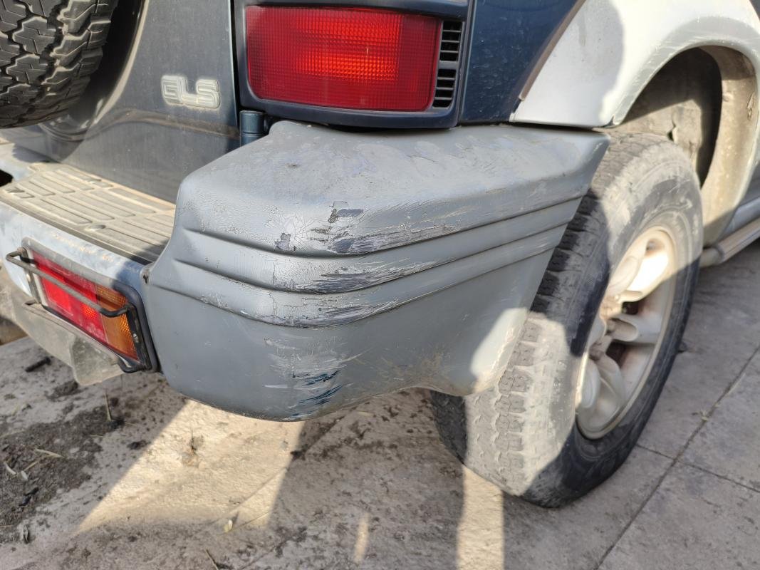 Puntera paragolpes trasero derecho Mitsubishi Montero 2.8 TD (V46W, V26W) (125 cv)